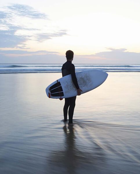 man with surfboard